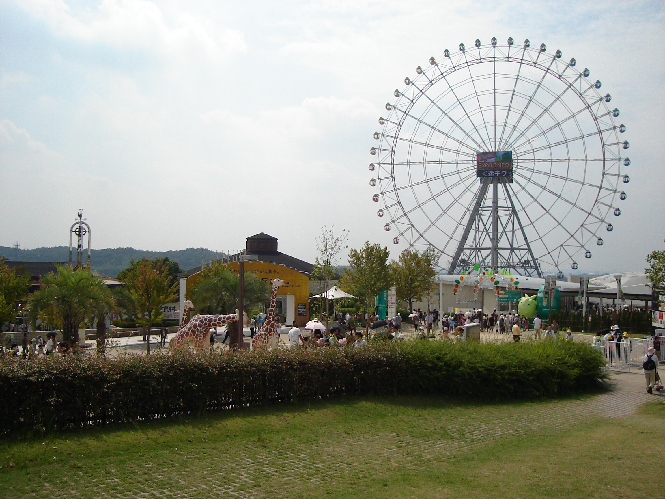 the expo site is dominated by a ferris wheel