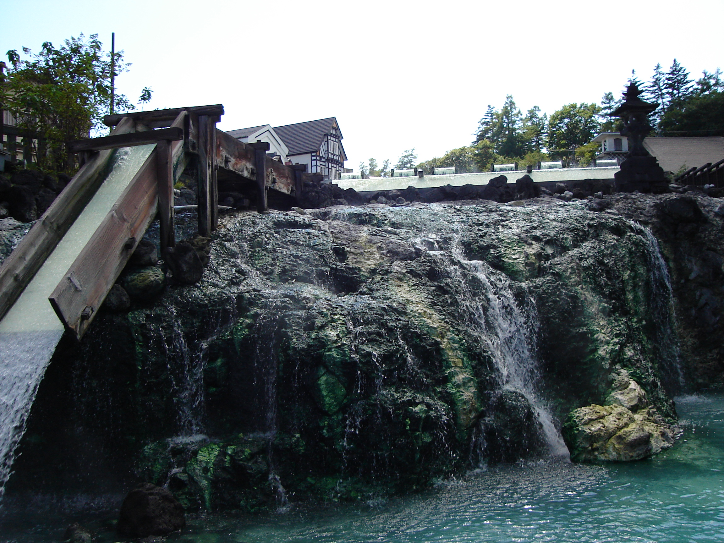 water cascading down a sluice to a lower area