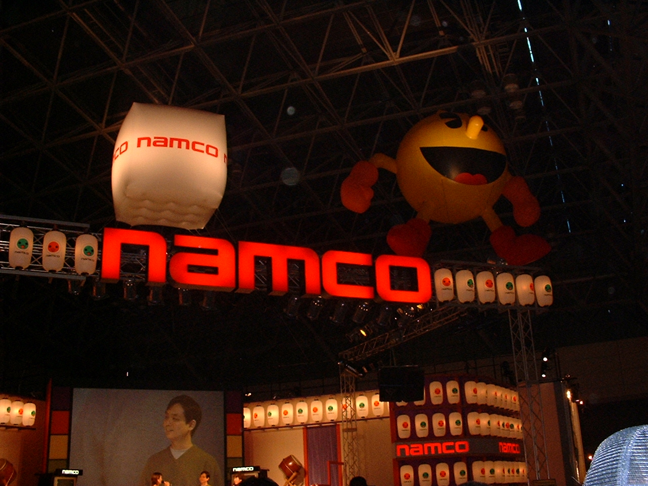 an inflated pac-man above a namco sign