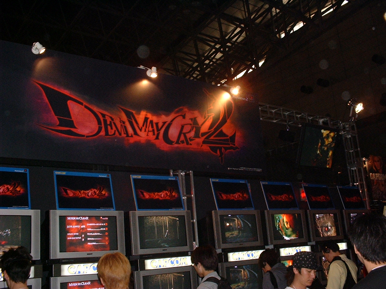 a row of demo units below a large logo for devil may cry 2