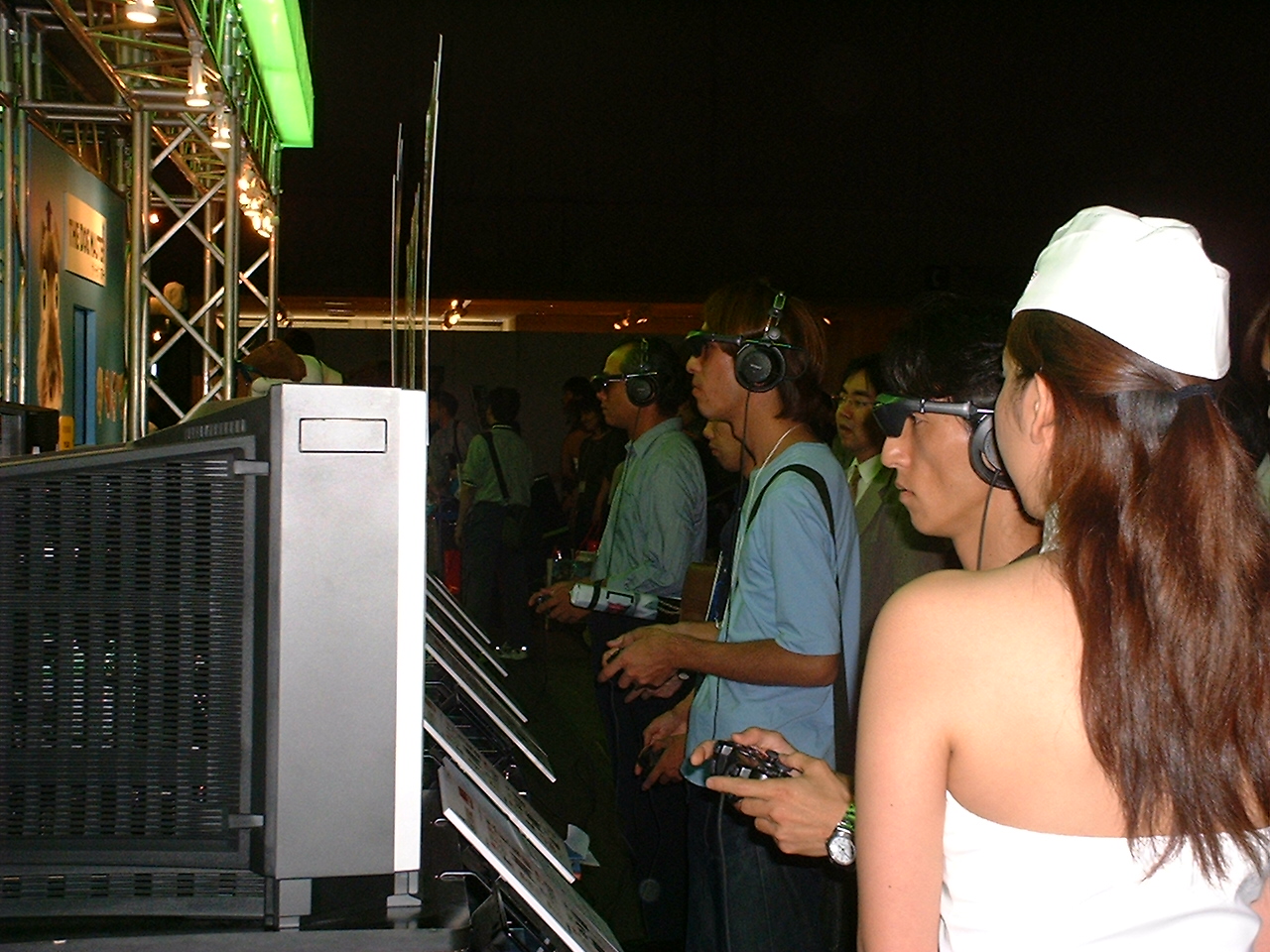 a sideview of the man playing shows the head mounted display.