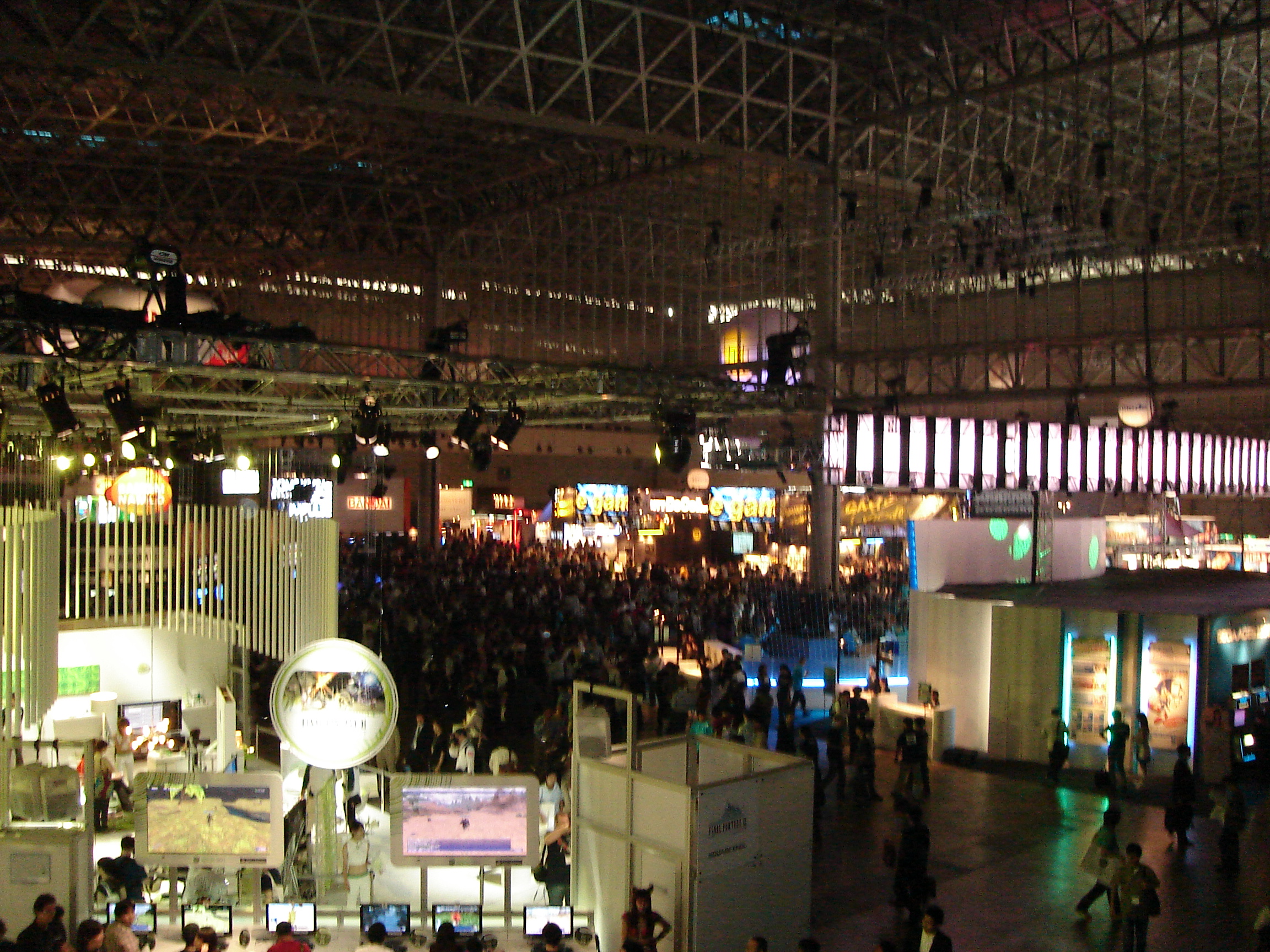 a view of the convention booths from a height