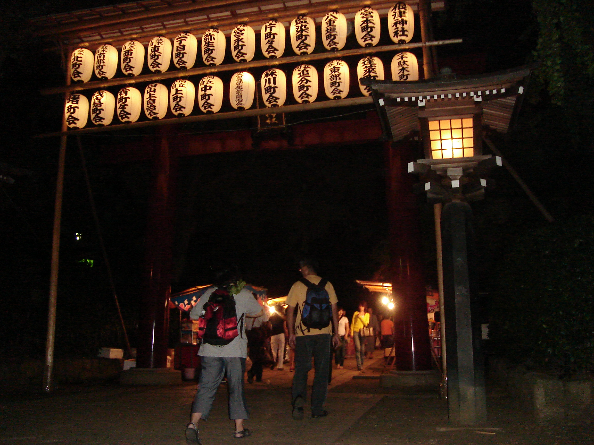 laterns frame the entrance to nezu shrine