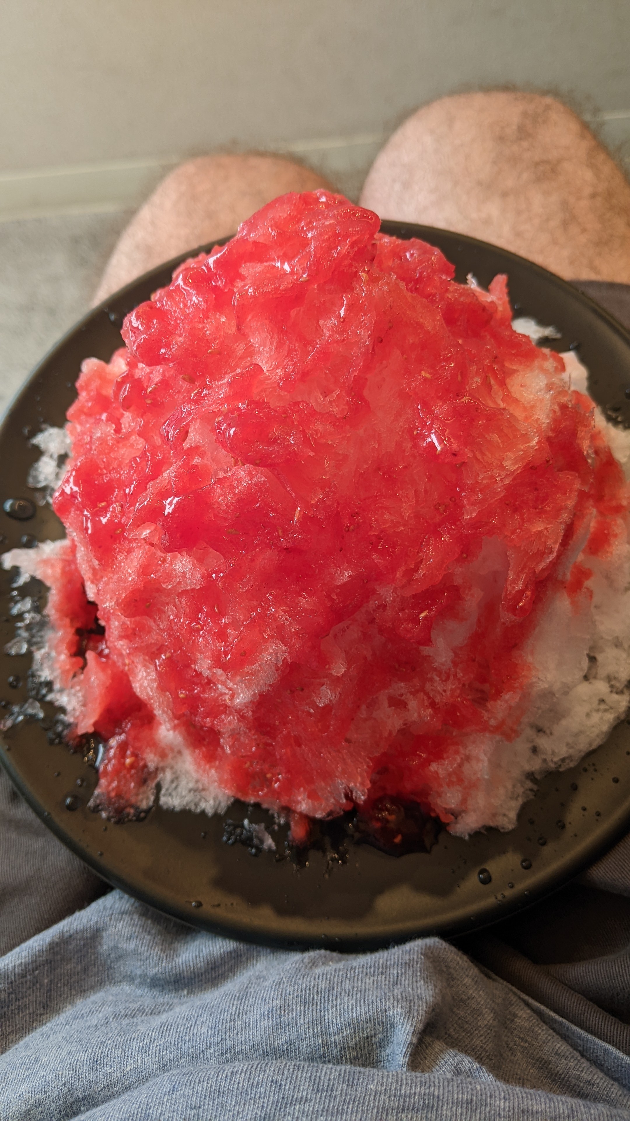 Looking down at my strawberry red shaved ice