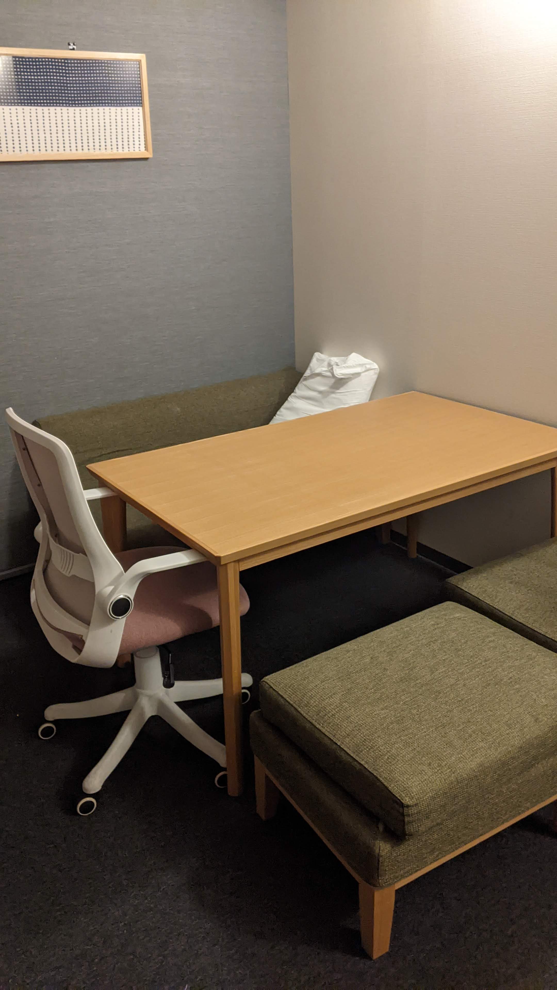 table and bench seating with an office chair