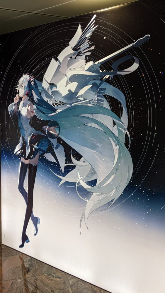 wall art of Hatsune Miku on dark background