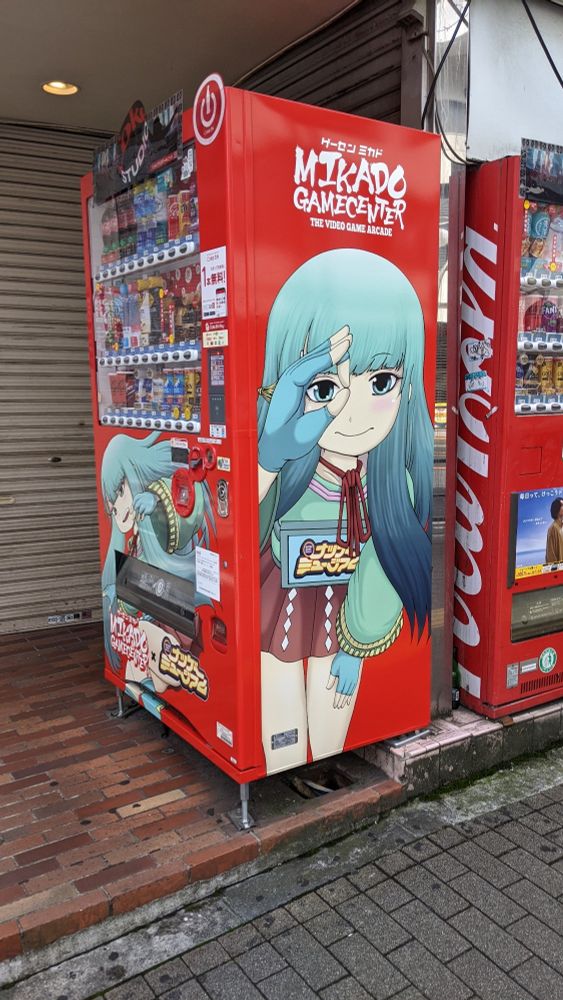 Vending machine with Mikado logo and mascot designs